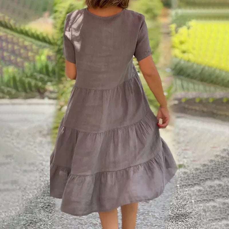 Emma - Bawełniana lniana sukienka z dekoltem w kształcie litery V. Monochromatyczna